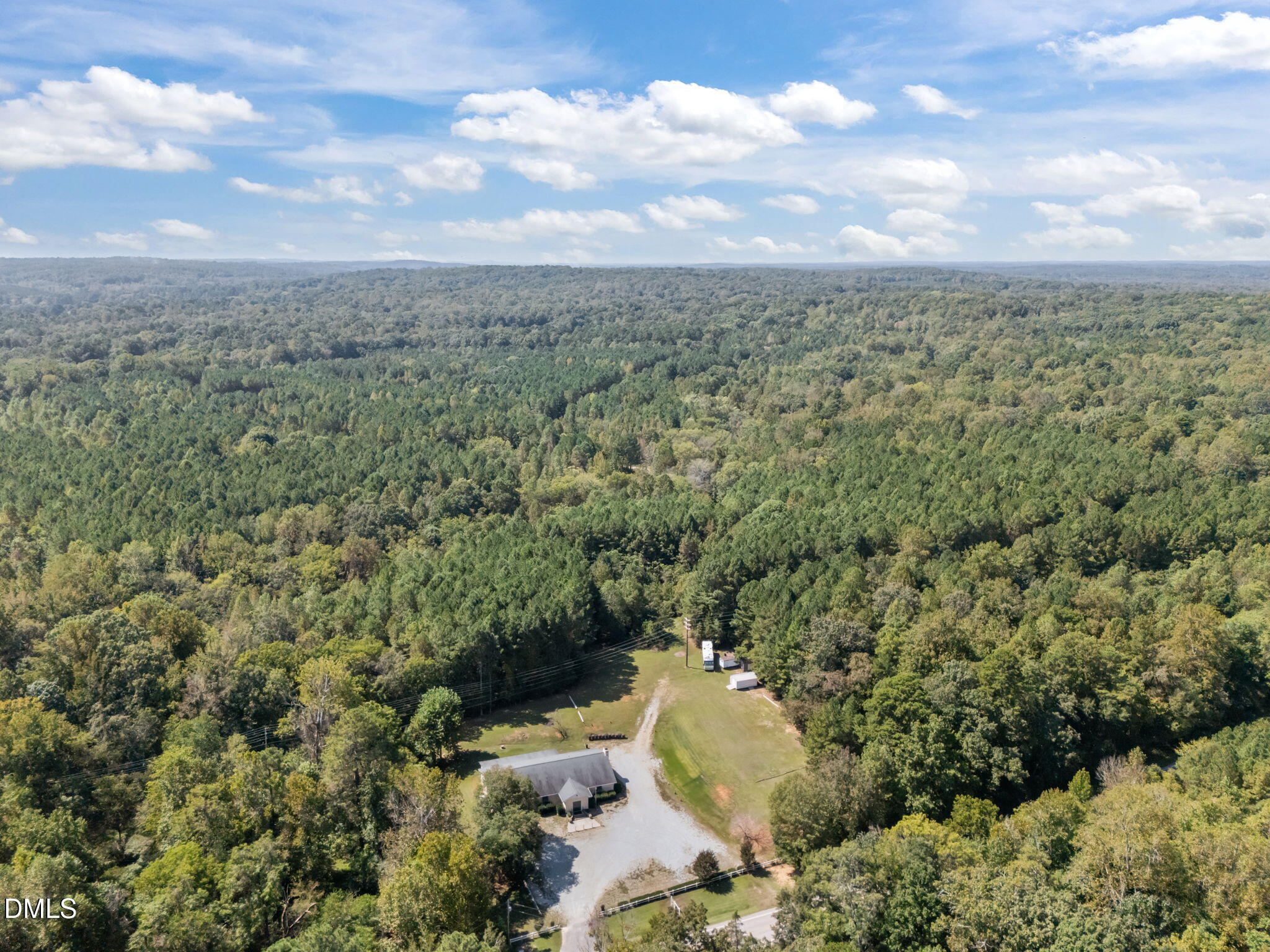 7409 Guess Road Hillsborough, NC 27278 - Photo 6 of 13 a view of a big yard with lots of green space