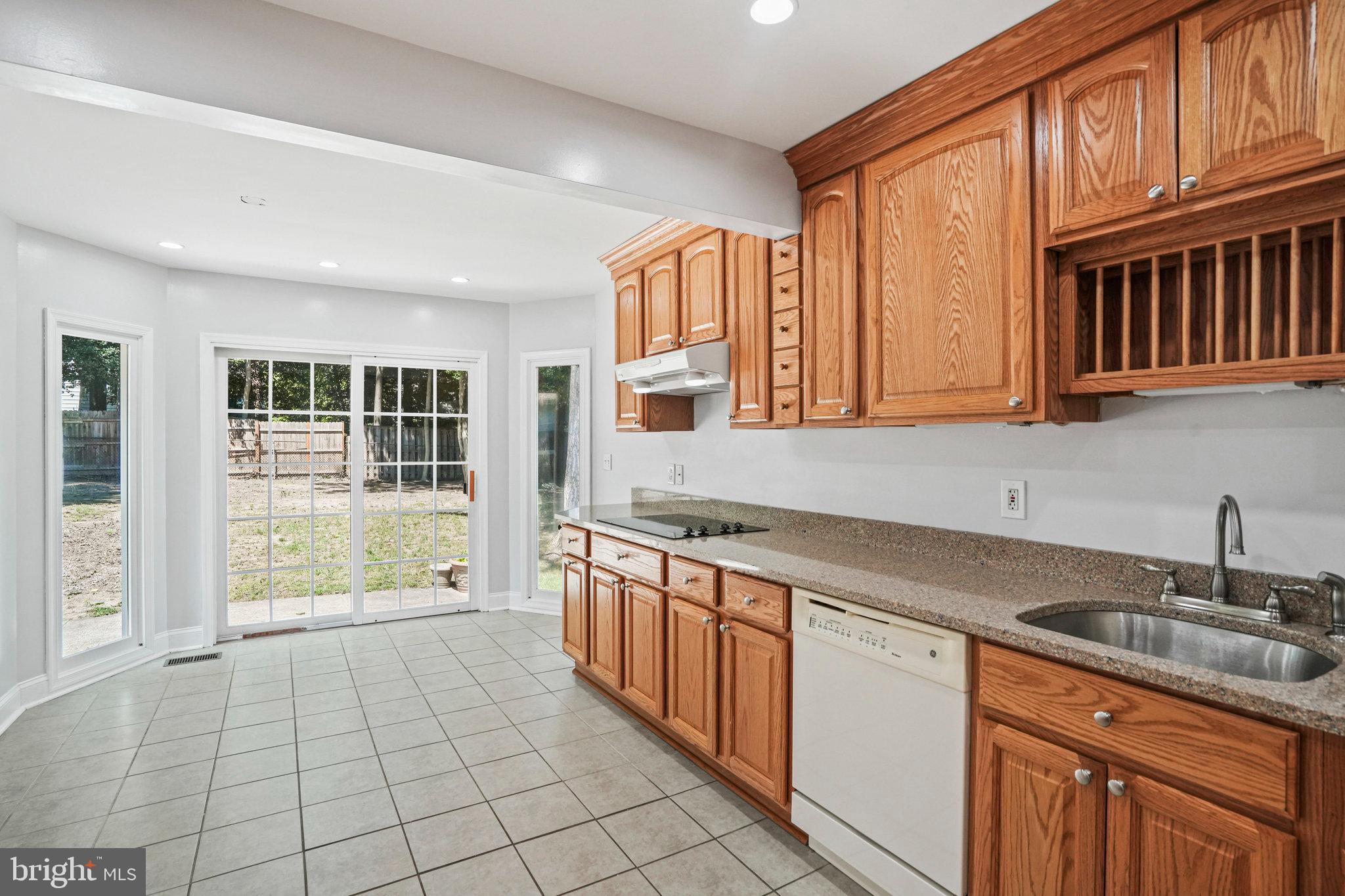 6116 Goodman Road Laurel, MD 20707 - Photo 11 of 42 Large Kitchen with Custom Extension