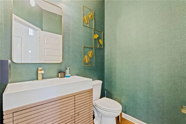 a bathroom with a sink and a toilet