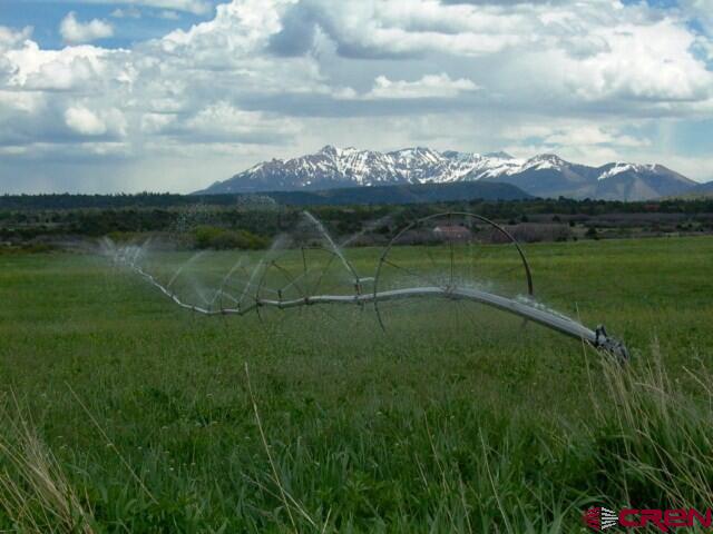 2 V44 Road Norwood, CO 81423 - Photo 1 of 18 a view of a golf course with a lake