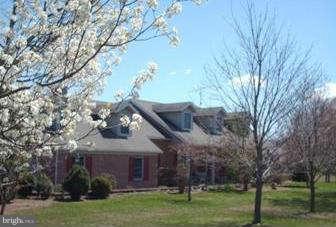 1602 Pious Ridge Road Berkeley Springs, WV 25411 - Photo 1 of 30 Exterior (Front)