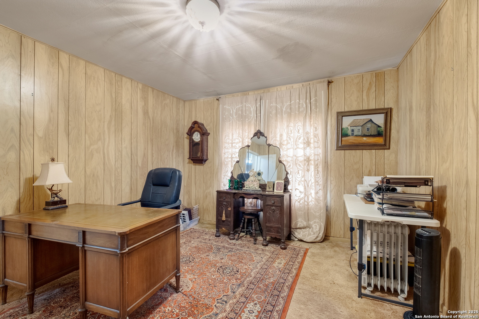 461 Highway 173 Devine, TX 78016 - Photo 14 of 27 a room with furniture and a window