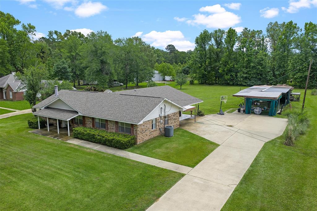 927 Stonewall-Preston Road Stonewall, LA 71078 - Photo 4 of 28 a aerial view of a house with yard patio and green space