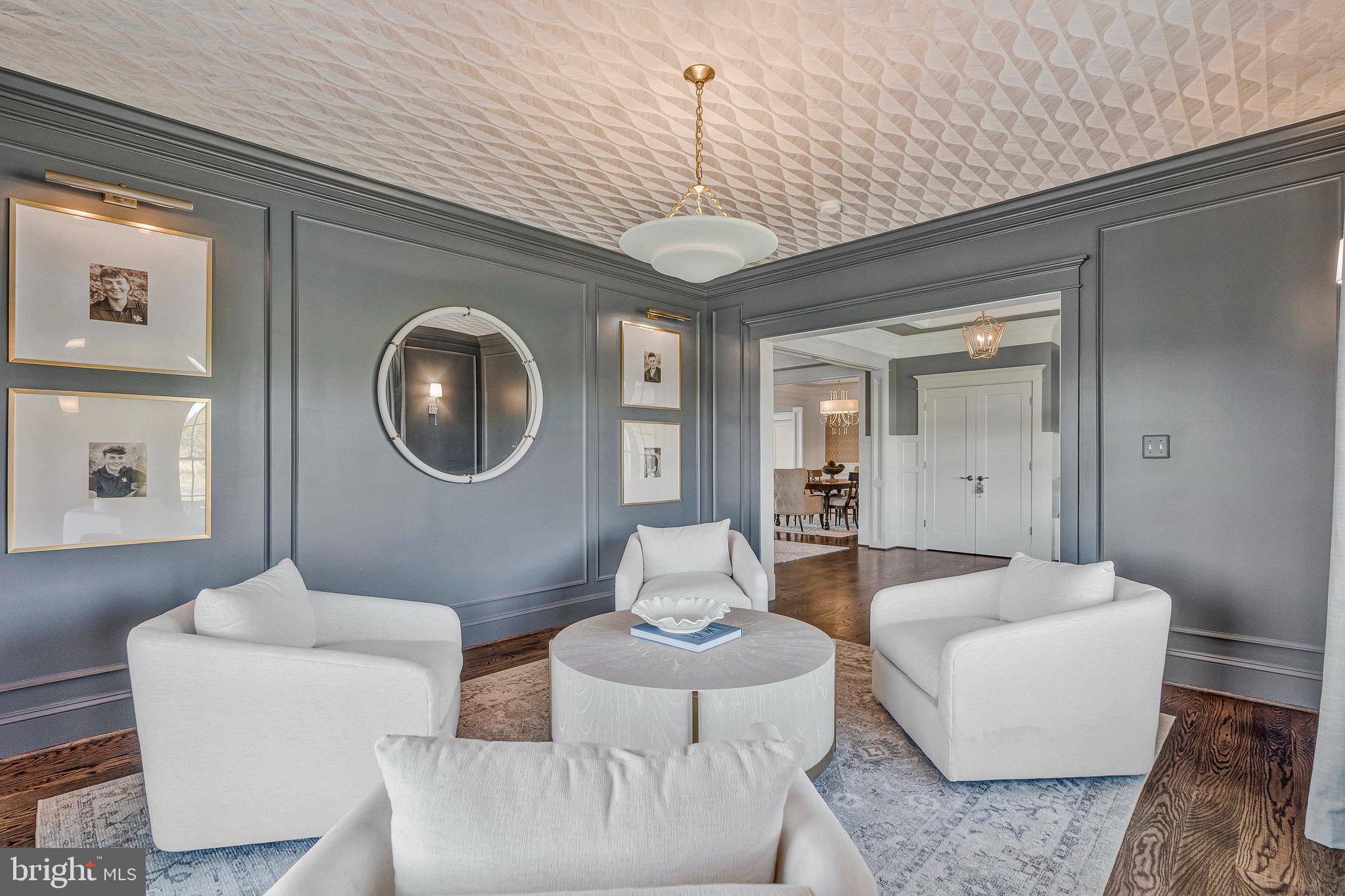 41865 Scotchbridge Place Ashburn, VA 20148 - Photo 21 of 93 a living room with furniture and a large mirror