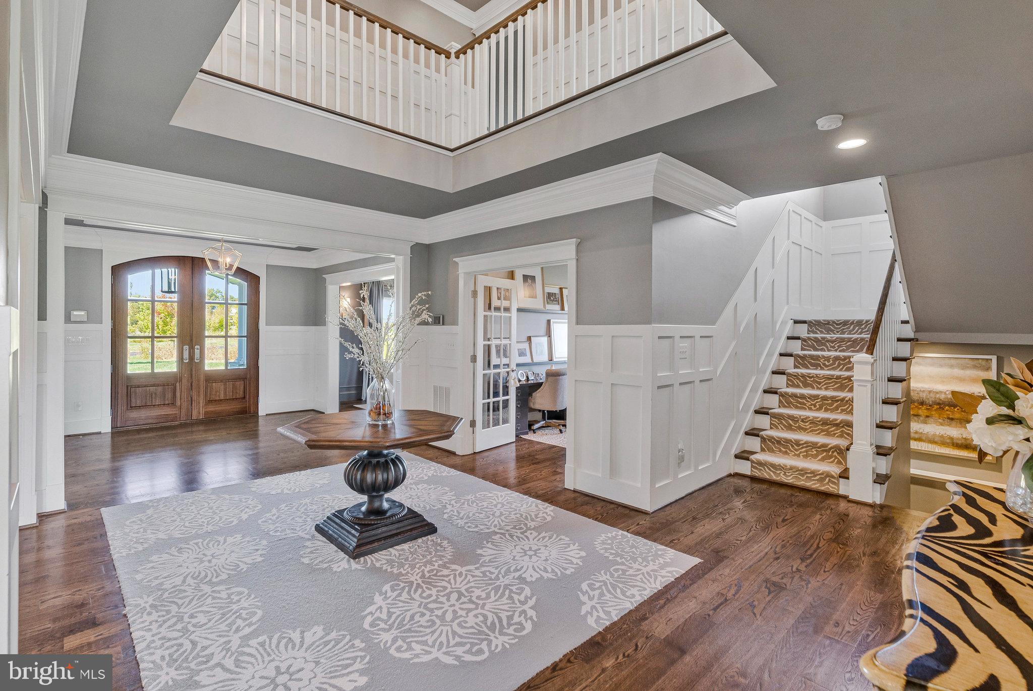 41865 Scotchbridge Place Ashburn, VA 20148 - Photo 23 of 93 a living room with furniture and wooden floor
