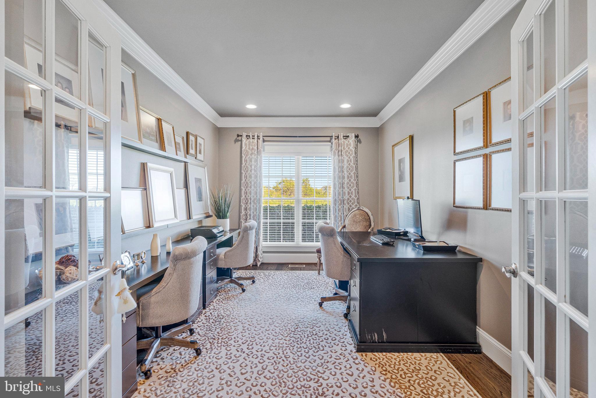 41865 Scotchbridge Place Ashburn, VA 20148 - Photo 24 of 93 a living room with furniture and a large window