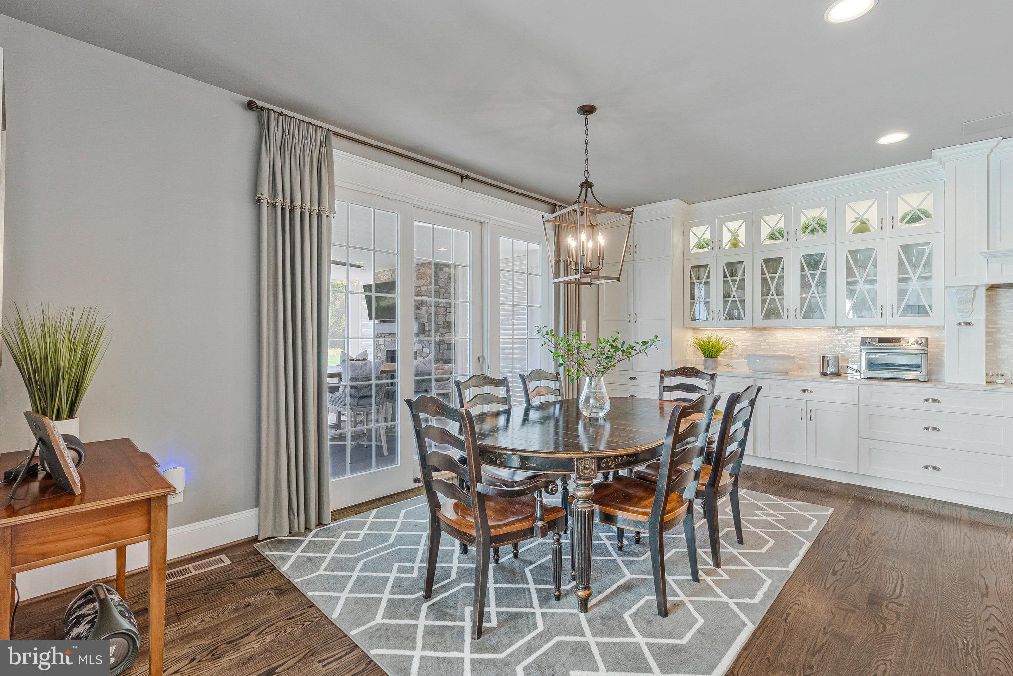 41865 Scotchbridge Place Ashburn, VA 20148 - Photo 38 of 93 a view of a dining room with furniture and window
