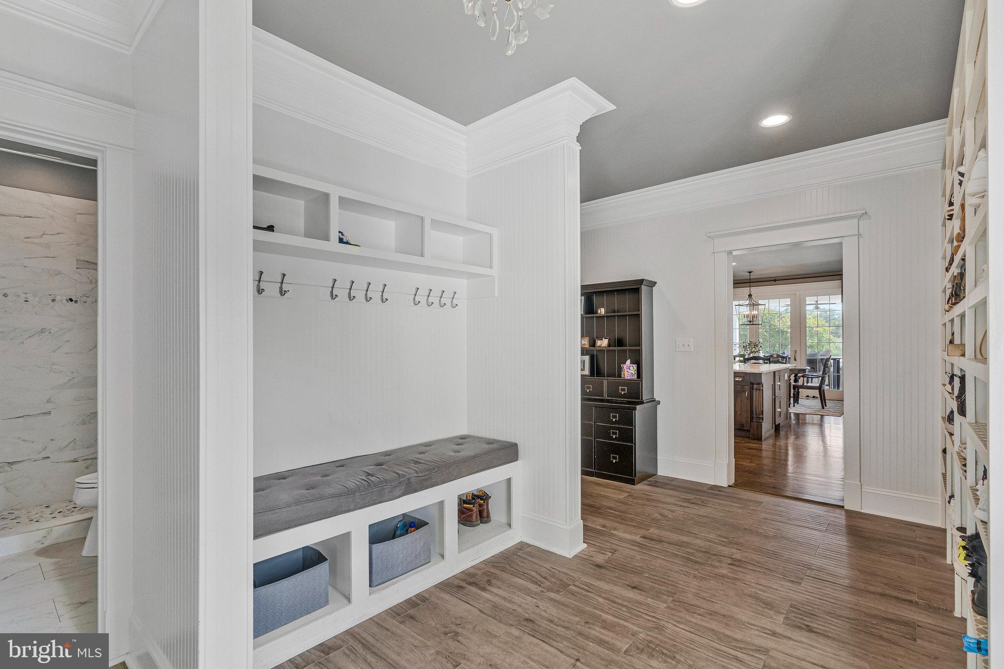 41865 Scotchbridge Place Ashburn, VA 20148 - Photo 40 of 93 a kitchen with stainless steel appliances and wooden floor