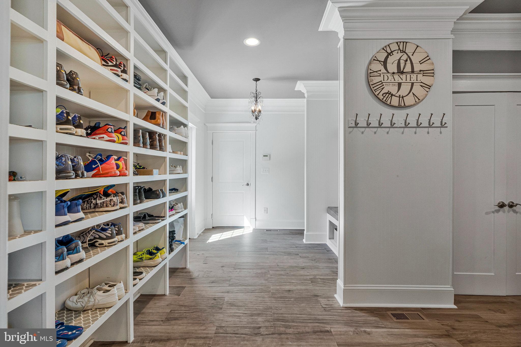 41865 Scotchbridge Place Ashburn, VA 20148 - Photo 42 of 93 a view of walk in closet with clothes and shoes