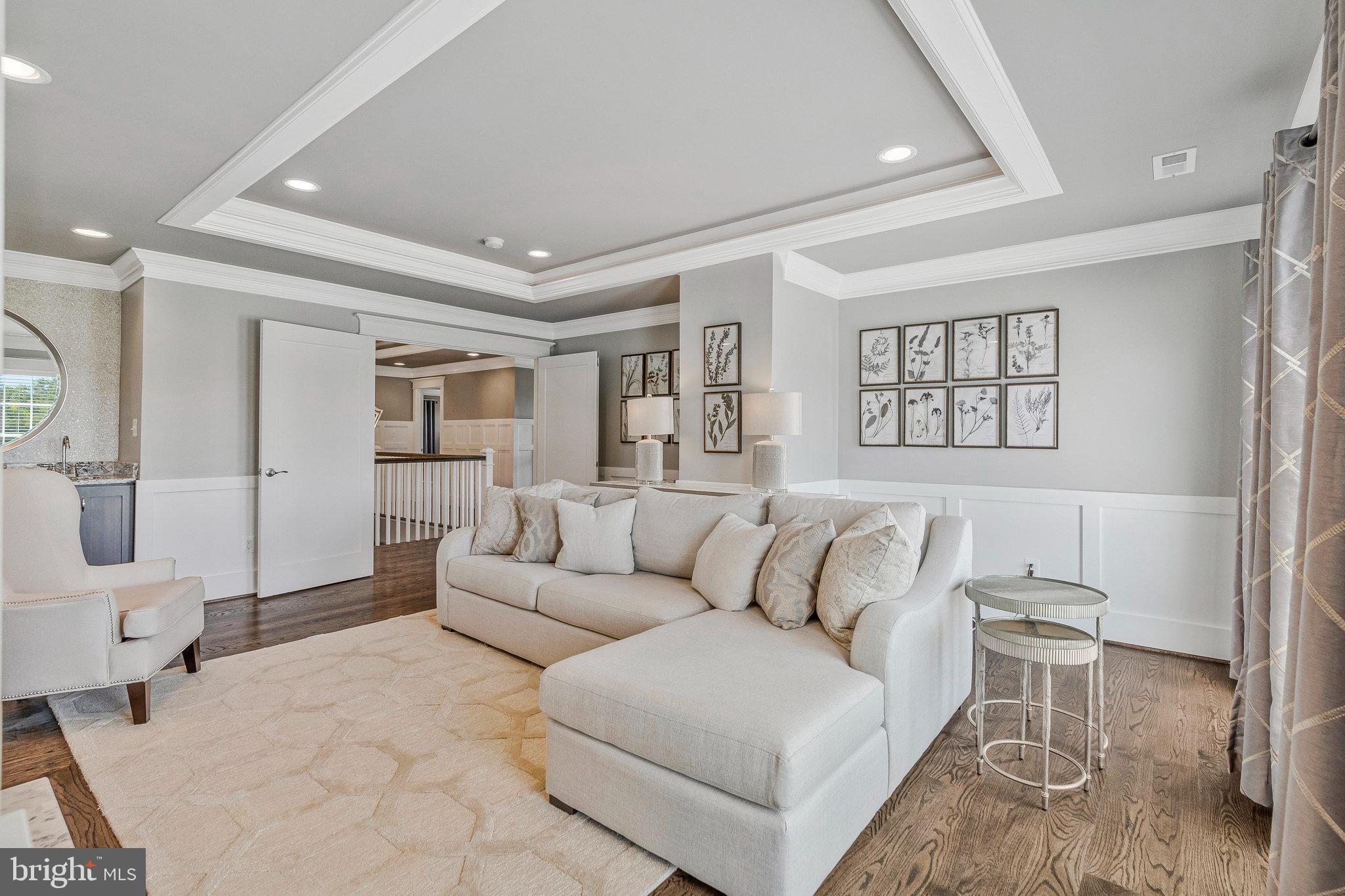 41865 Scotchbridge Place Ashburn, VA 20148 - Photo 44 of 93 a living room with furniture and a table
