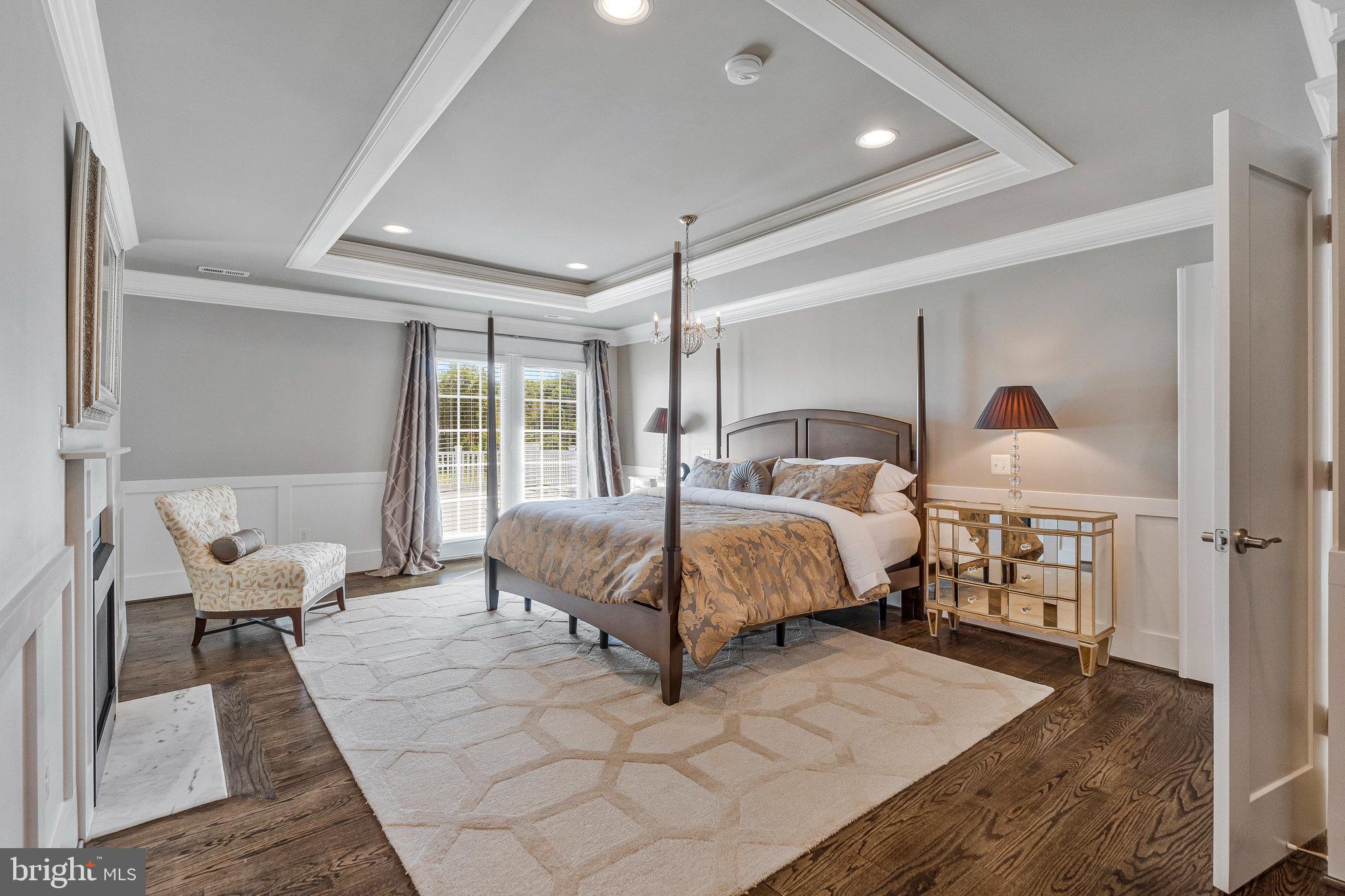 41865 Scotchbridge Place Ashburn, VA 20148 - Photo 48 of 93 a bedroom with a large bed and a window