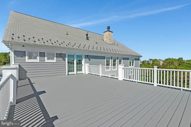 41865 Scotchbridge Place Ashburn, VA 20148 - Photo 50 of 93 a view of a house with a wooden deck