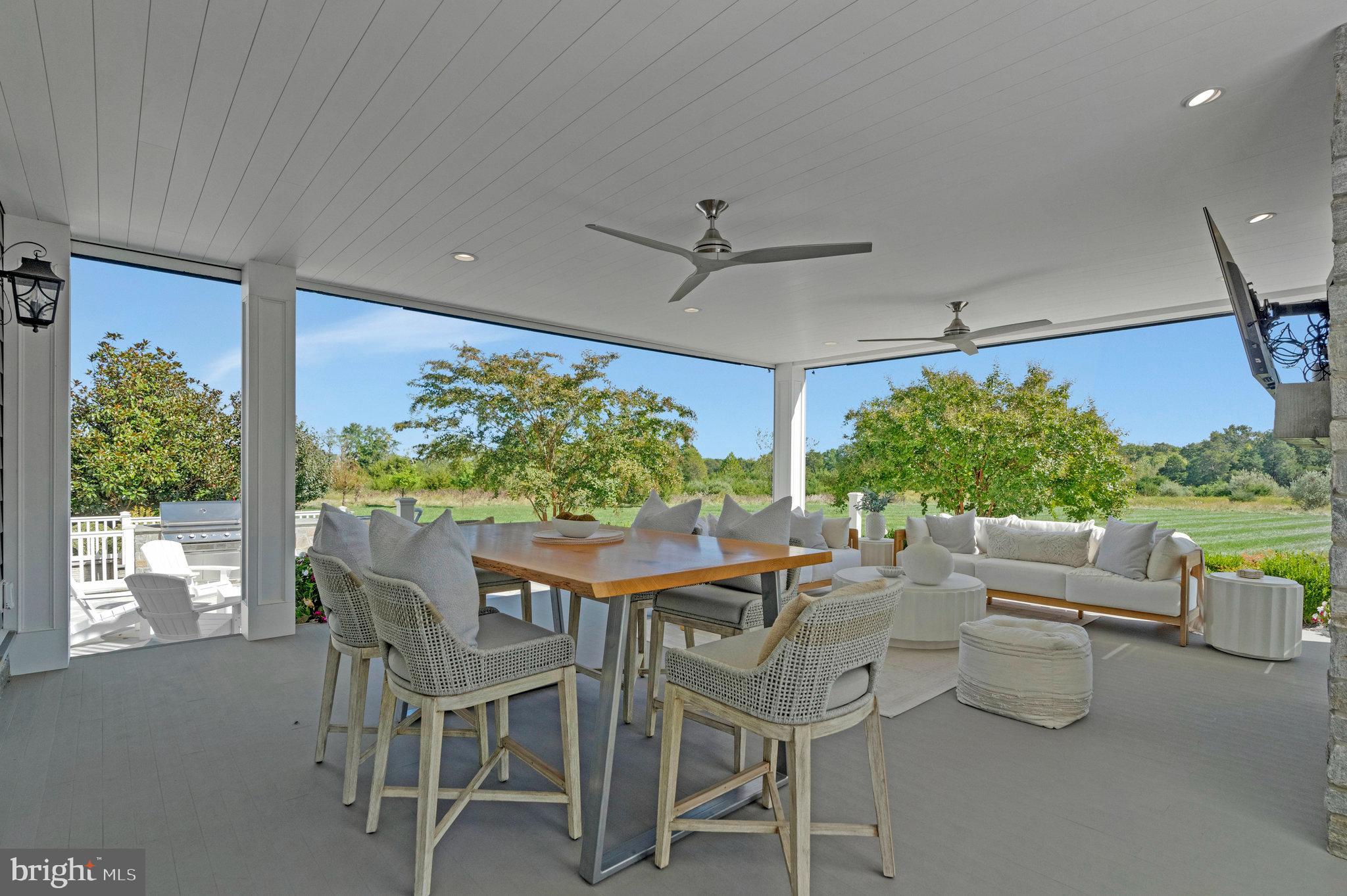 41865 Scotchbridge Place Ashburn, VA 20148 - Photo 71 of 93 a view of a dining room with furniture window and outside view