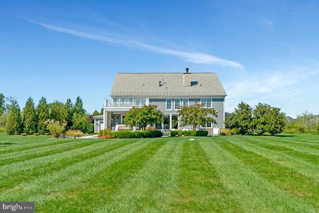 41865 Scotchbridge Place Ashburn, VA 20148 - Photo 83 of 93 a view of a big yard with plants and large trees