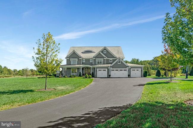 41865 Scotchbridge Place Ashburn, VA 20148 - Photo 93 of 93 front view of a house with a yard