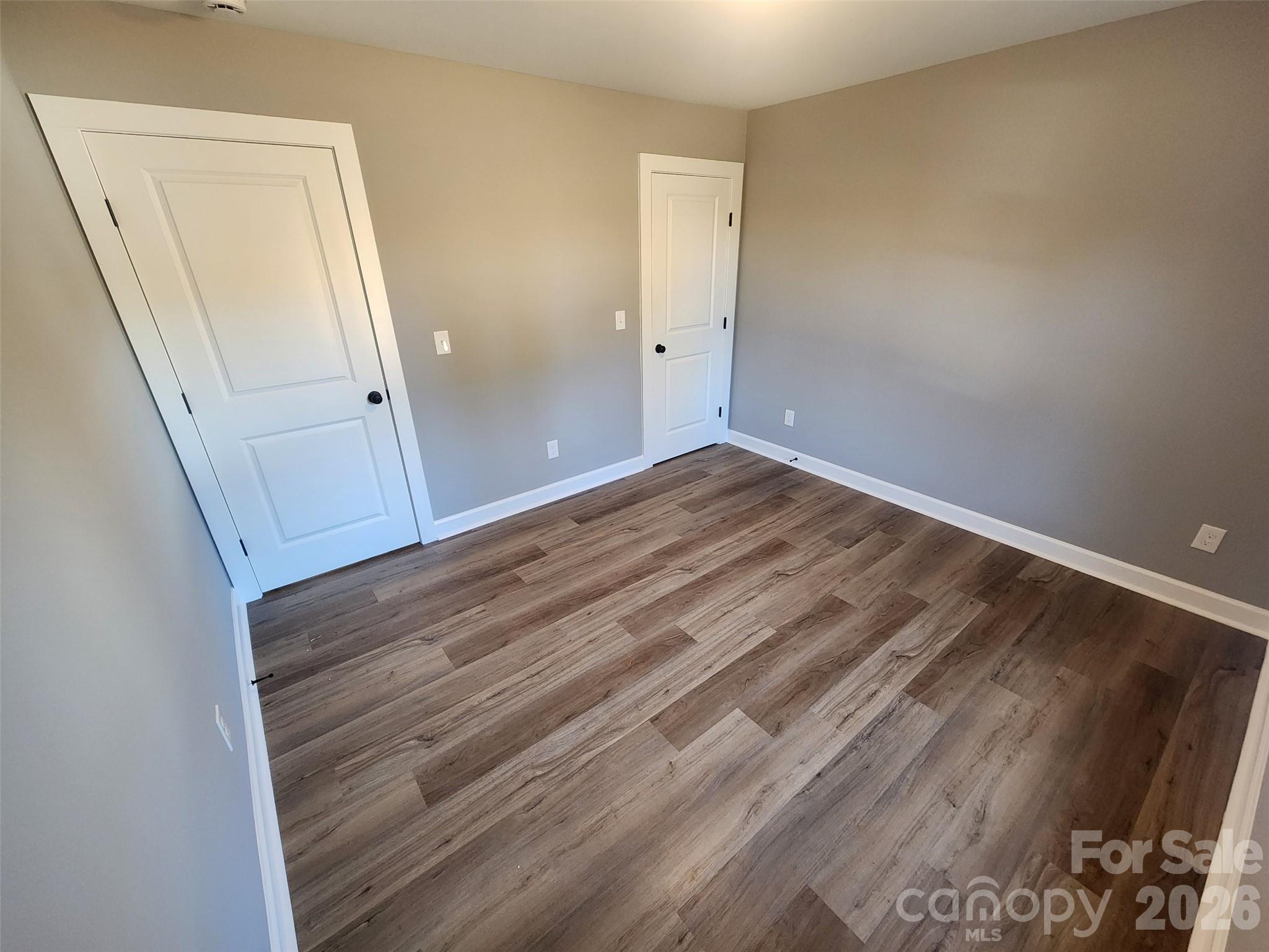 450 East Ridge Road Salisbury, NC 28144 - Photo 6 of 11 a view of room with wooden floor