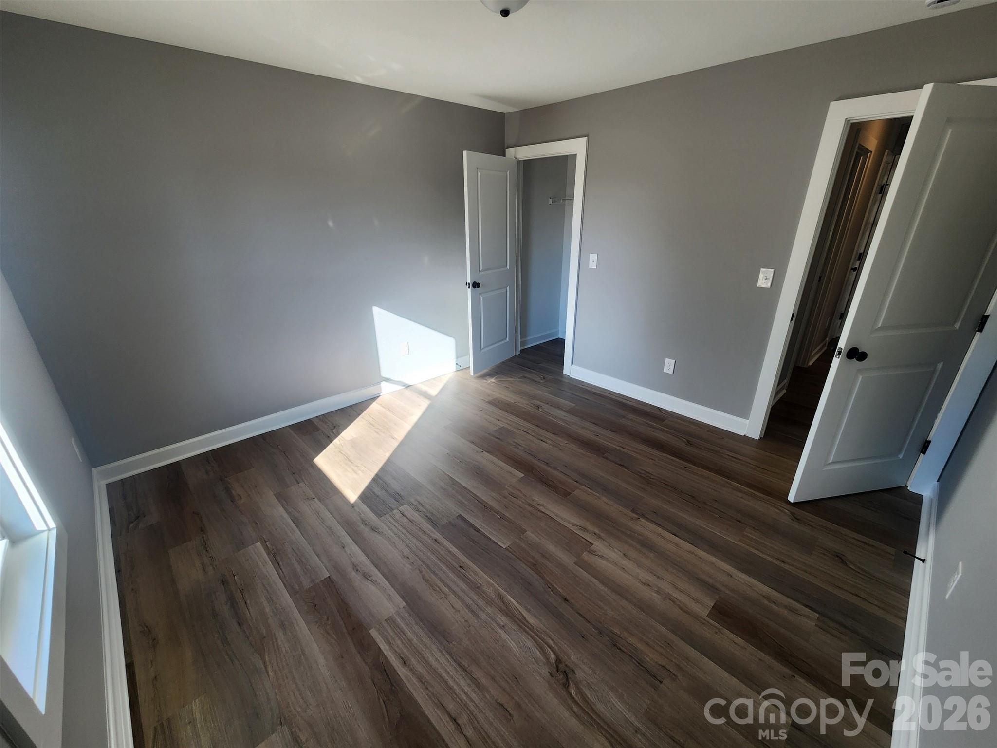 450 East Ridge Road Salisbury, NC 28144 - Photo 10 of 11 a view of wooden floor in an empty room