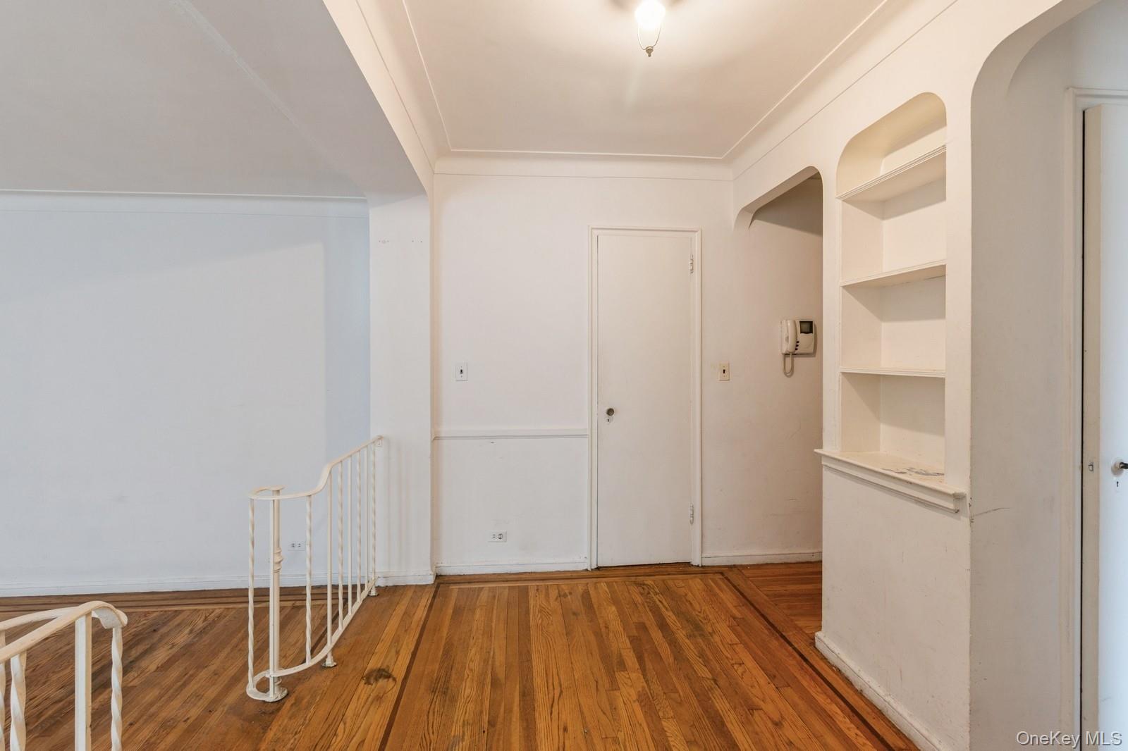 405 West 57th Street, Unit 4C Manhattan, NY 10019 - Photo 13 of 15 a view of empty room with wooden floor
