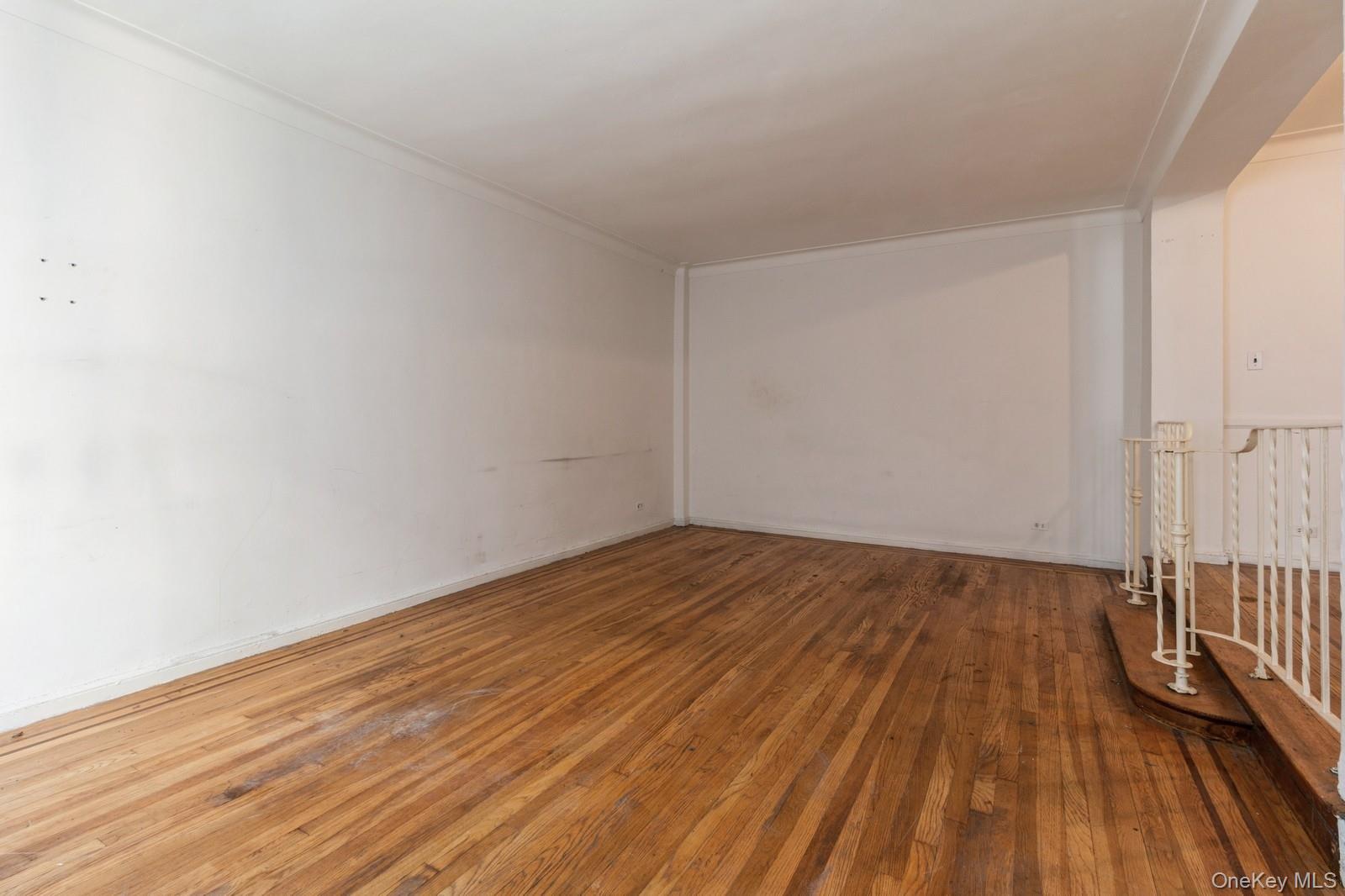 405 West 57th Street, Unit 4C Manhattan, NY 10019 - Photo 10 of 15 a view of a room with wooden floor and wooden floor