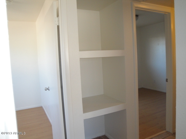 4234 East Apollo Road Phoenix, AZ 85042 - Photo 17 of 33 Linen storage between BR 2 and 3