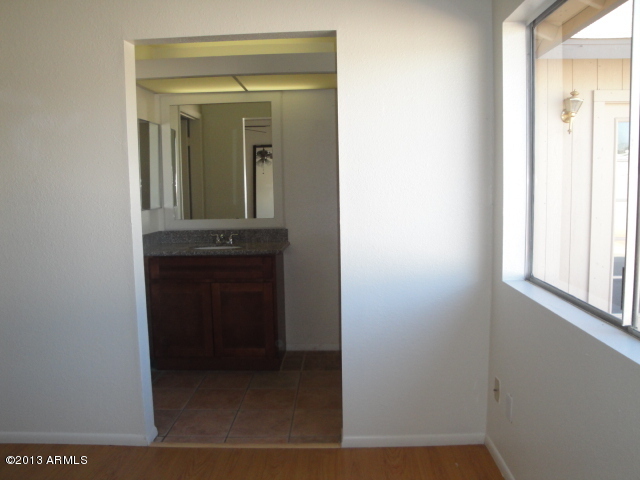 4234 East Apollo Road Phoenix, AZ 85042 - Photo 21 of 33 View from MBR into MA Bath