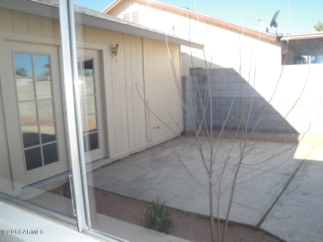 4234 East Apollo Road Phoenix, AZ 85042 - Photo 26 of 33 Back patio from MBR window