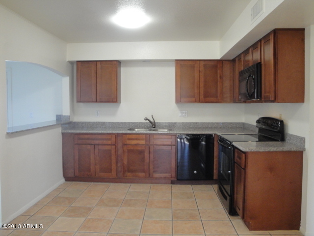 4234 East Apollo Road Phoenix, AZ 85042 - Photo 6 of 33 Kitchen from DR