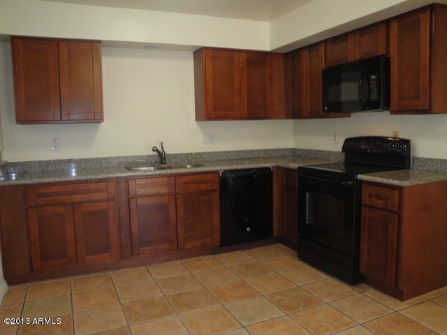 4234 East Apollo Road Phoenix, AZ 85042 - Photo 7 of 33 All new kitchen