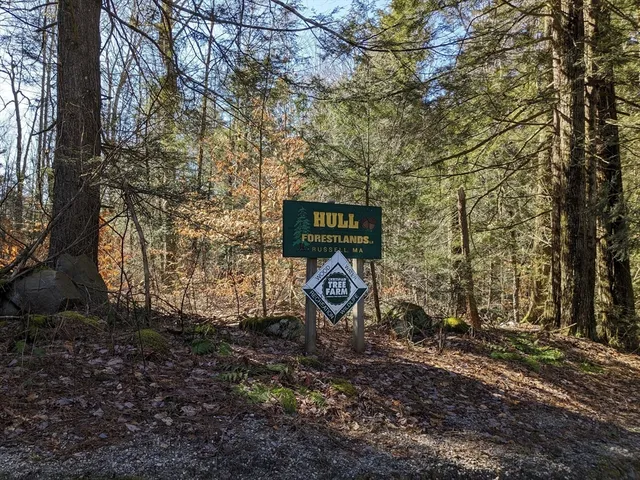 a sign that is on the side of the road