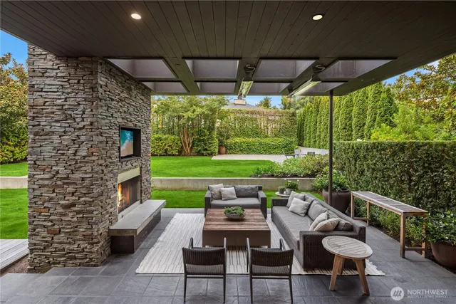 a view of yard with patio