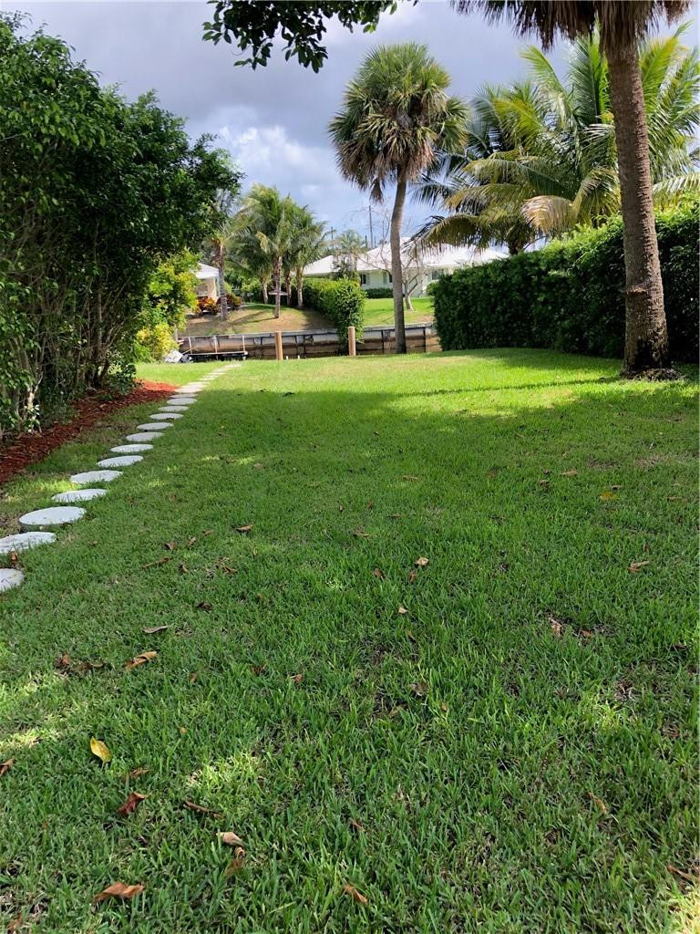 1230 Mulberry Way Boca Raton, FL 33486 - Photo 28 of 31 a view of a park with large trees