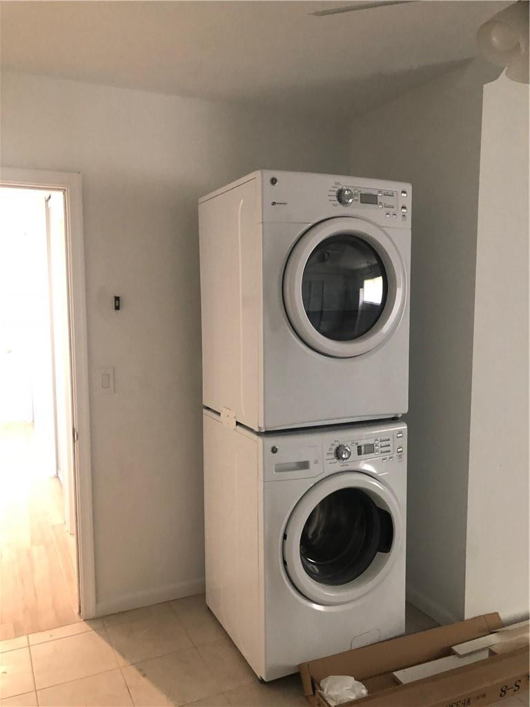 1230 Mulberry Way Boca Raton, FL 33486 - Photo 31 of 31 a utility room with dryer and washer