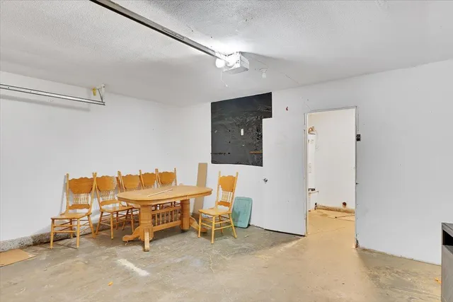 a view of hallway with chandelier