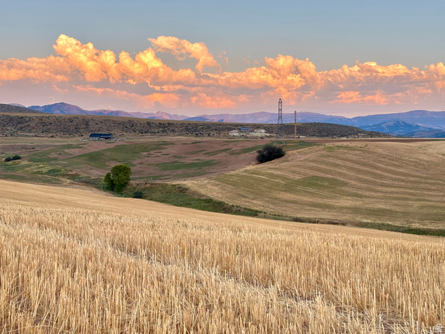 311 East Mail Rte Road Preston, ID 83263 - Photo 2 of 17 Expansive agricultural landscape featuring golden harvested fields and rolling hills