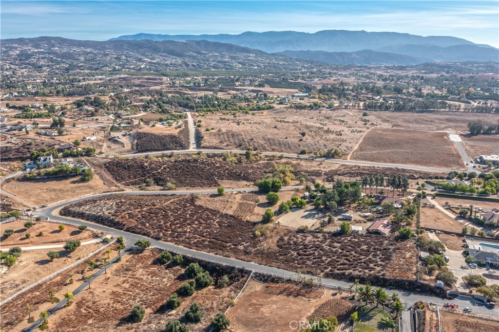 36555 Summitville Street Temecula, CA 92592 - Photo 8 of 10 an aerial view of residential houses with outdoor space