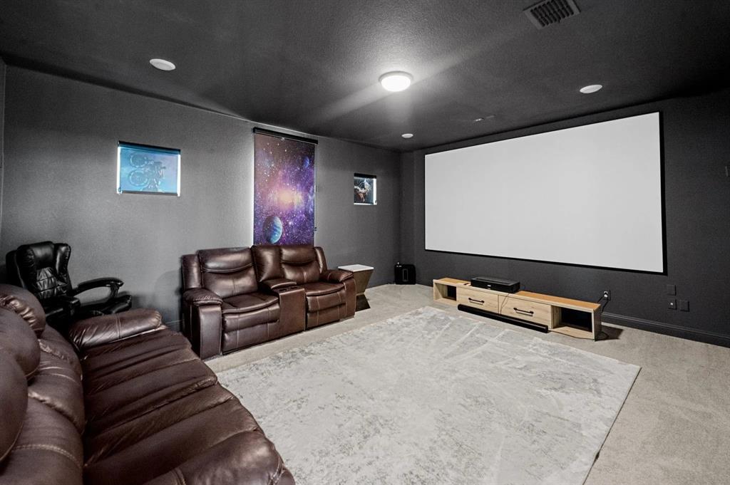 10969 Coastal Violet Road Frisco, TX 75035 - Photo 27 of 30 Mediterranean / spanish-style home featuring stucco siding, driveway, and a garage