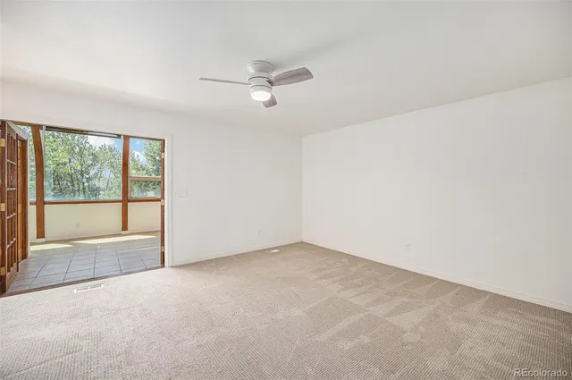 a bathroom with a bath tub sink mirror and a shower