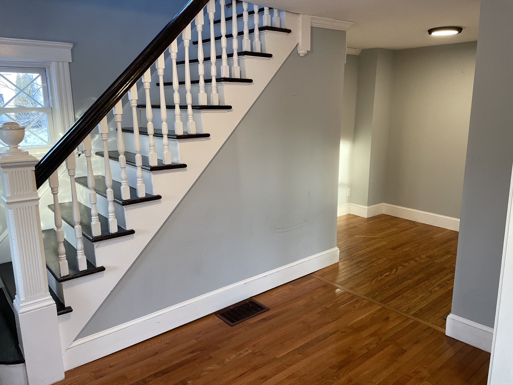 6 Brattle Street Worcester, MA 01606 - Photo 2 of 20 a view of entryway with wooden floor