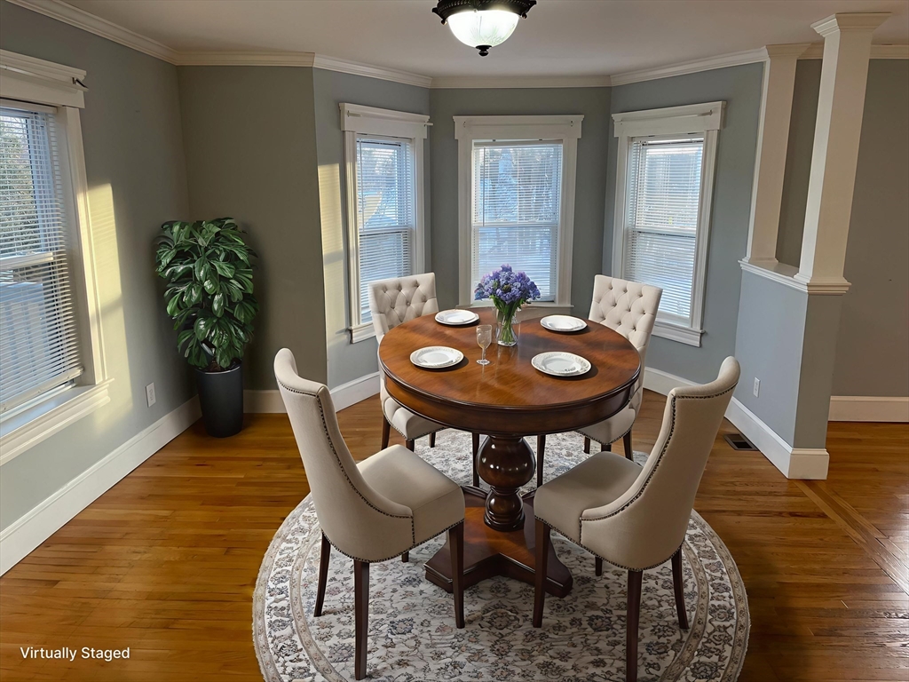 6 Brattle Street Worcester, MA 01606 - Photo 5 of 20 a view of a dining room with furniture and wooden floor