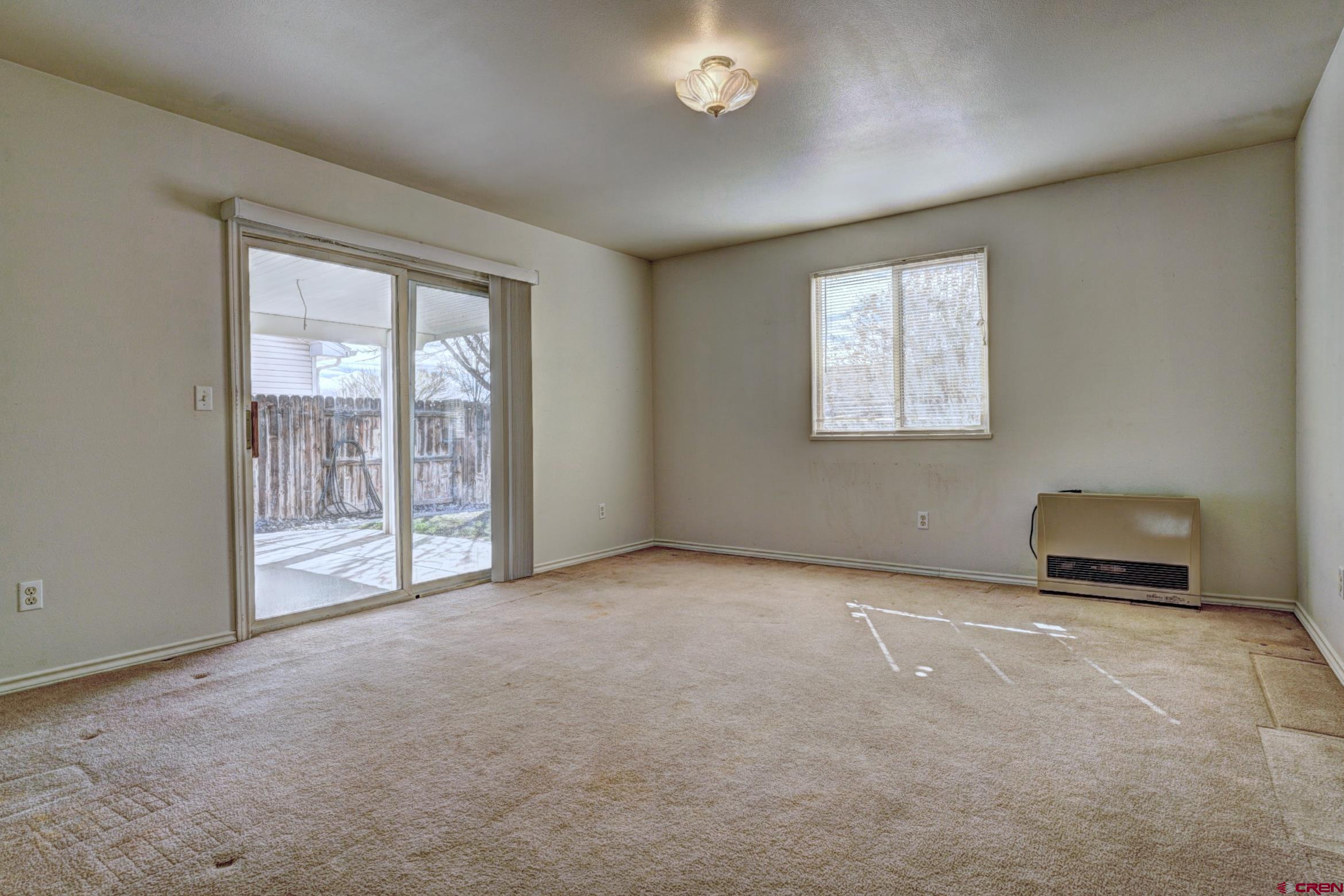 3119 D 3/4 Road Grand Junction, CO 81504 - Photo 12 of 31 an empty room with windows