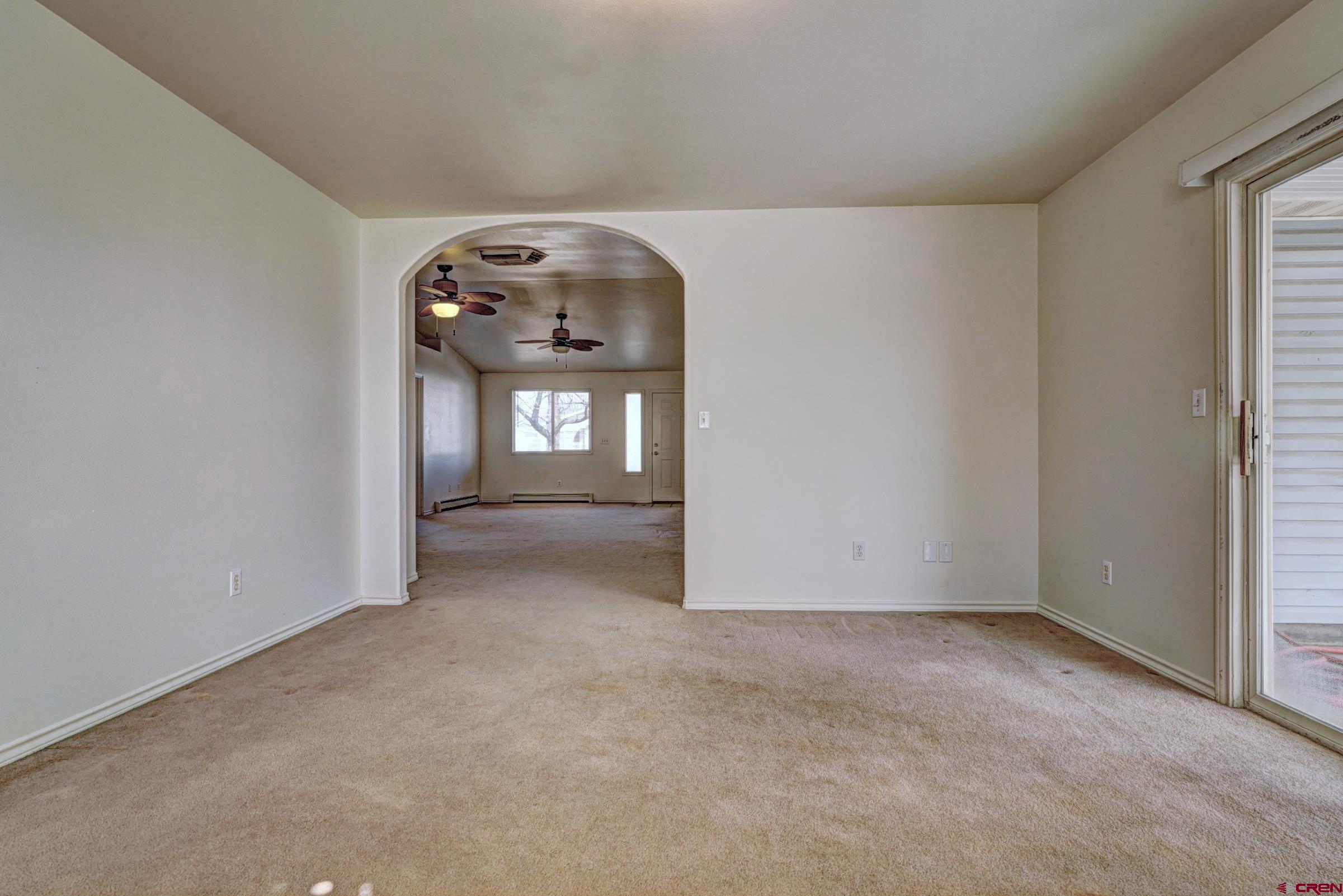 3119 D 3/4 Road Grand Junction, CO 81504 - Photo 13 of 31 an empty room with windows