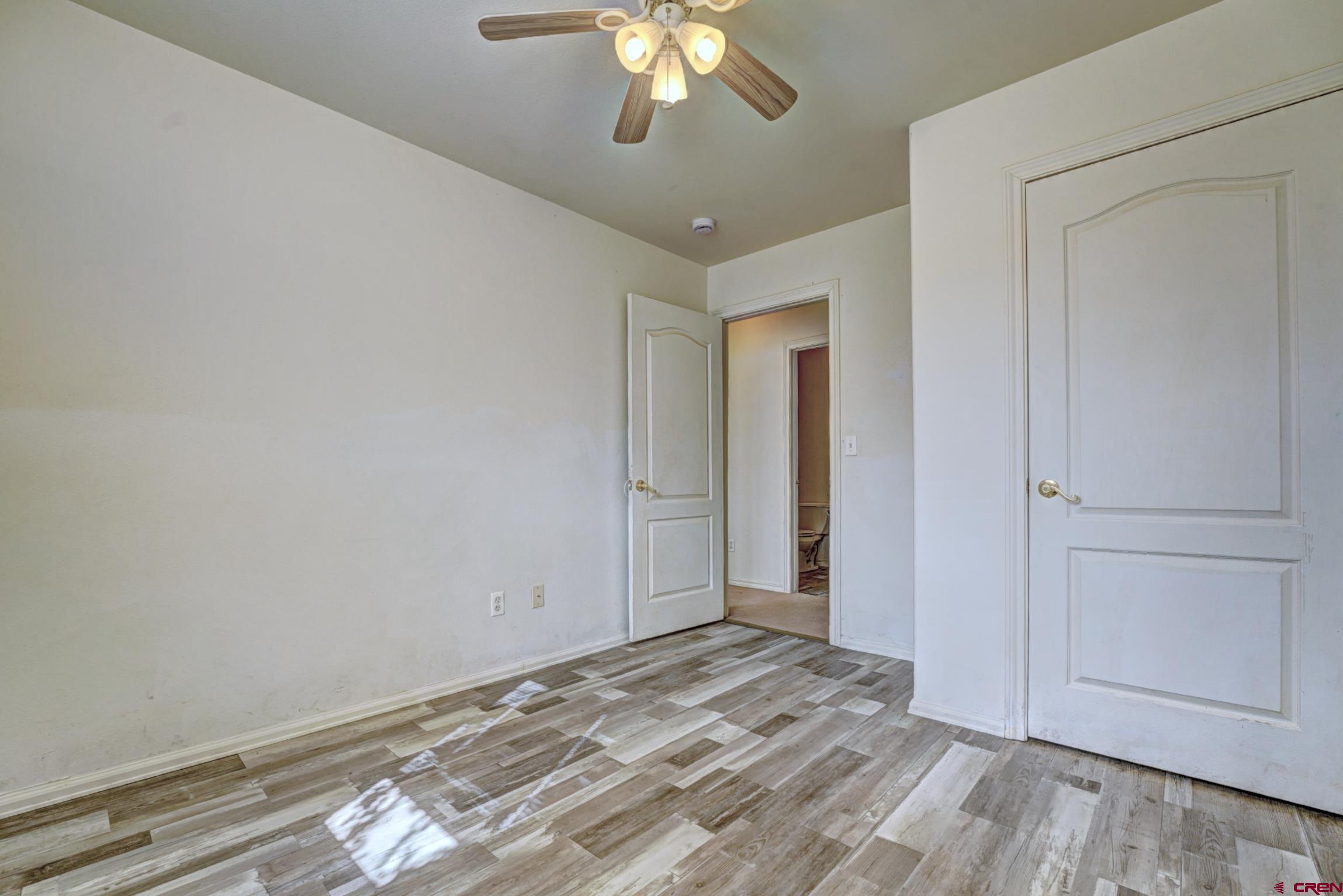 3119 D 3/4 Road Grand Junction, CO 81504 - Photo 18 of 31 a view of a livingroom with a chandelier fan
