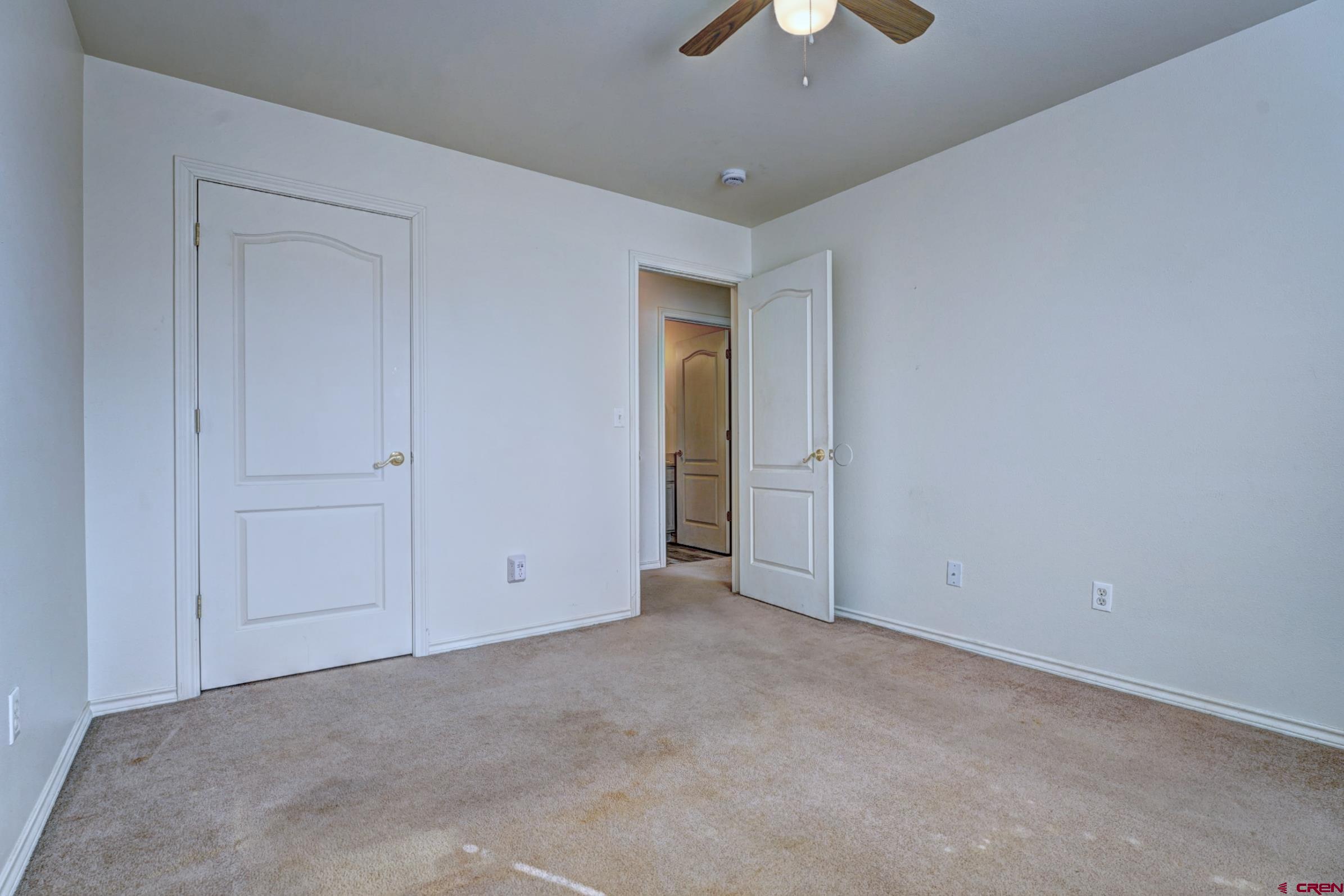 3119 D 3/4 Road Grand Junction, CO 81504 - Photo 21 of 31 an empty room with closet area