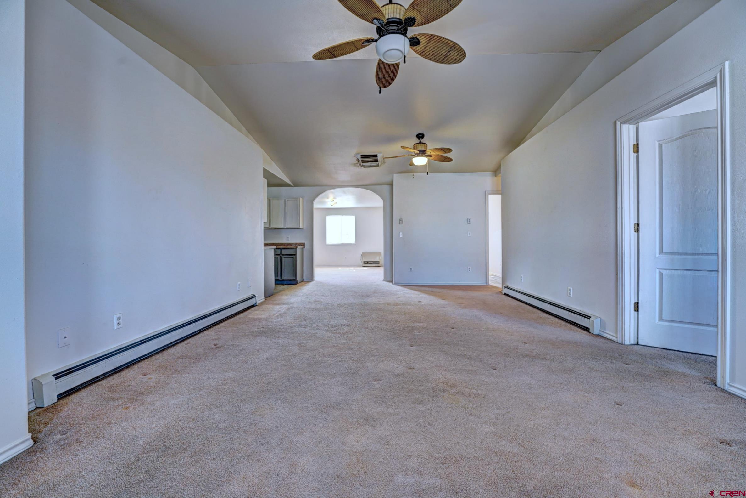 3119 D 3/4 Road Grand Junction, CO 81504 - Photo 4 of 31 a view of a livingroom with a ceiling fan