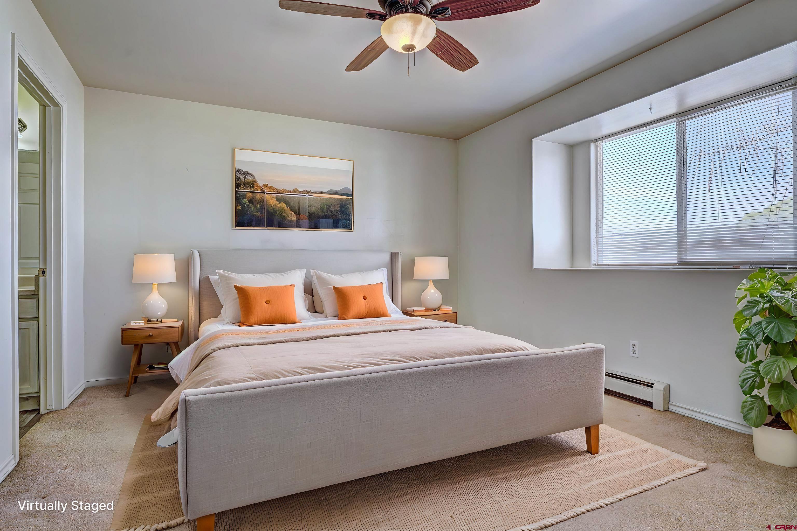 3119 D 3/4 Road Grand Junction, CO 81504 - Photo 10 of 31 a bedroom with bed and window