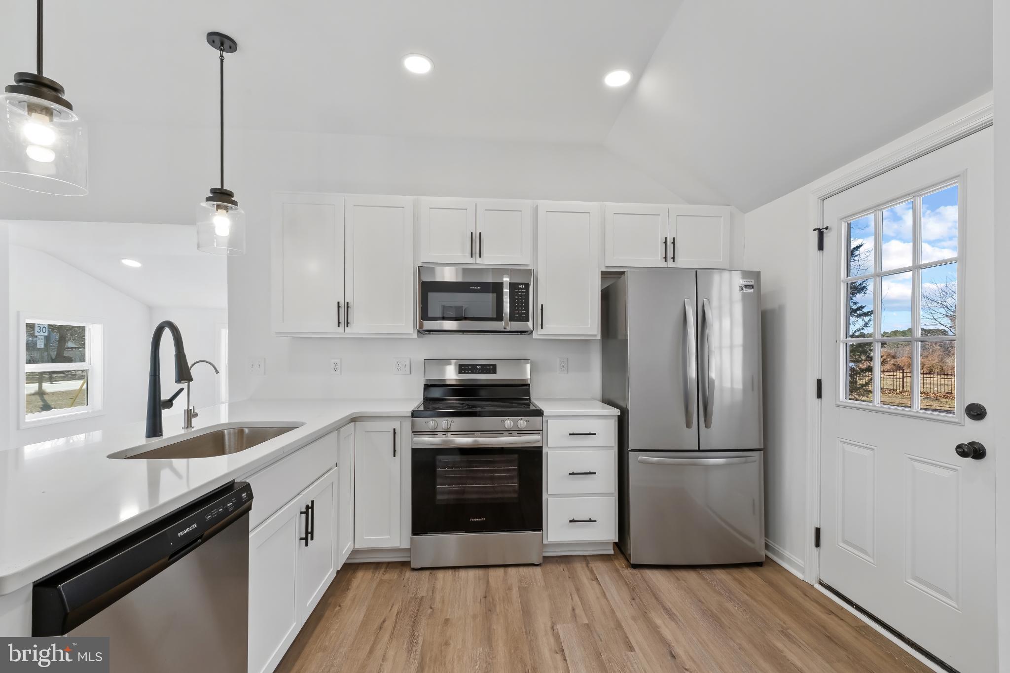 28272 Riverside Drive Salisbury, MD 21801 - Photo 29 of 33 Modern kitchen with sleek finishes.