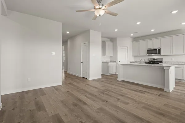 a view of kitchen with wooden floor