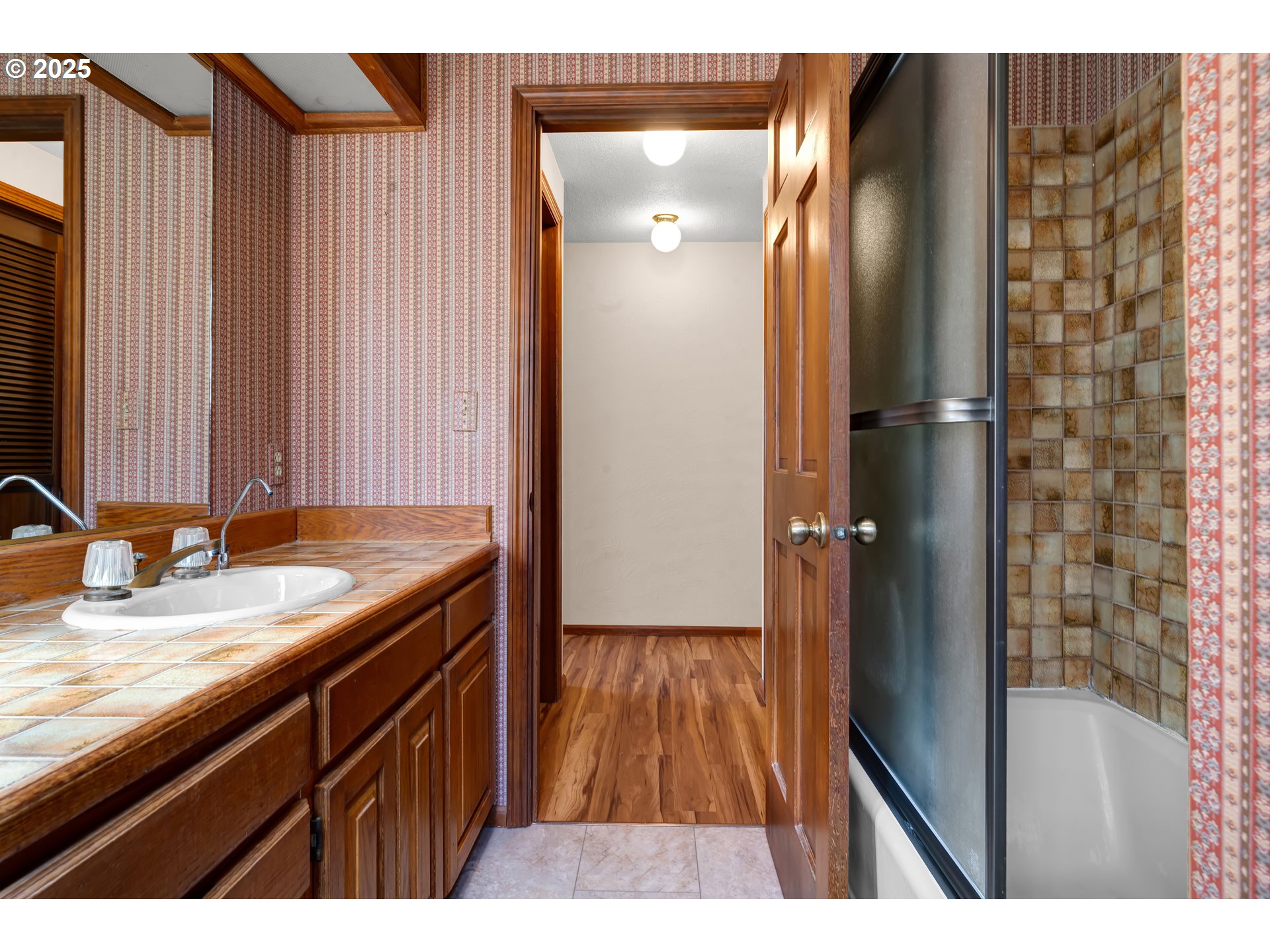 34520 Mathews Road Eugene, OR 97405 - Photo 21 of 42 a bathroom with a sink and a mirror