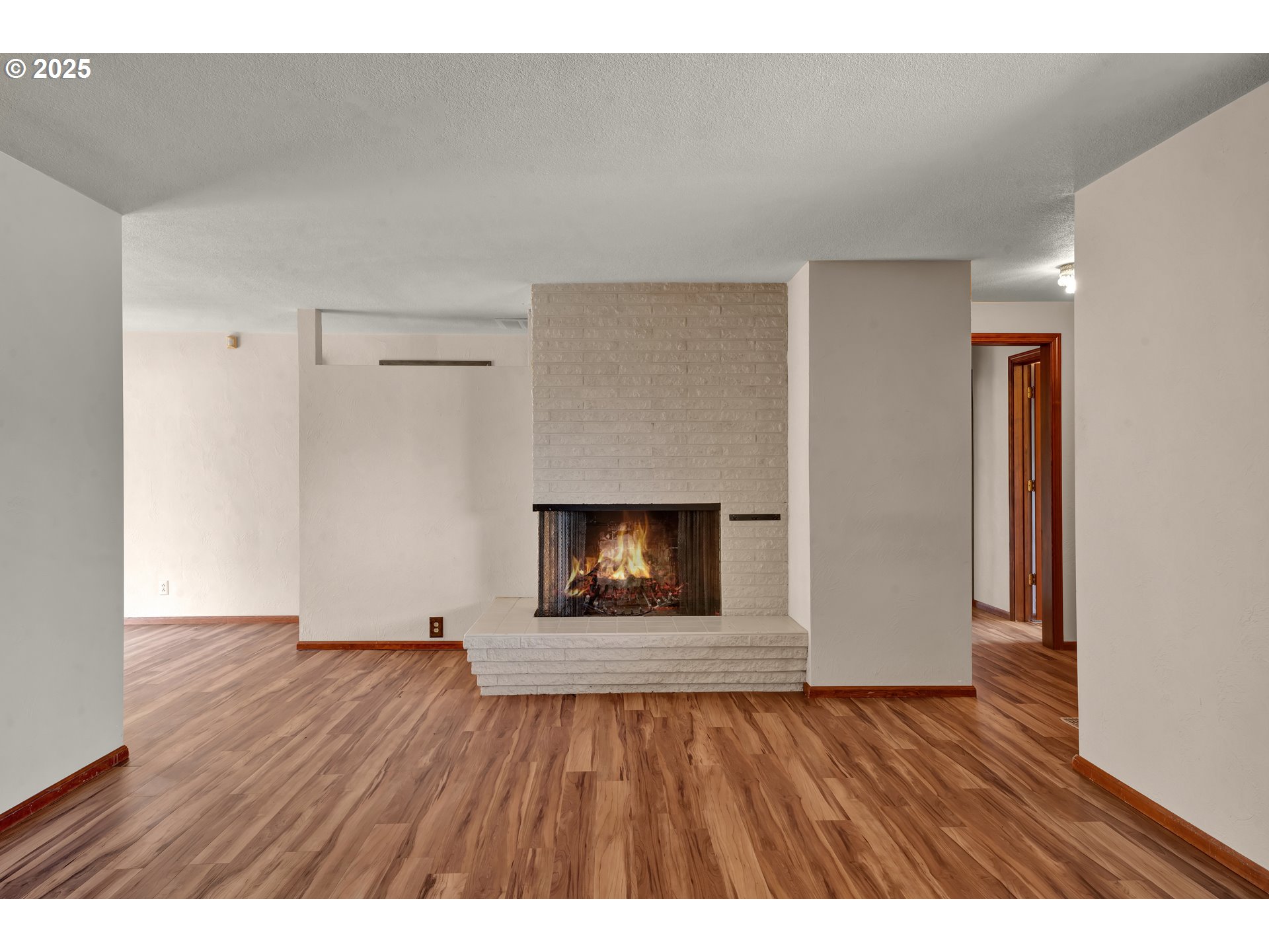 34520 Mathews Road Eugene, OR 97405 - Photo 7 of 42 a view of an empty room and wooden floor