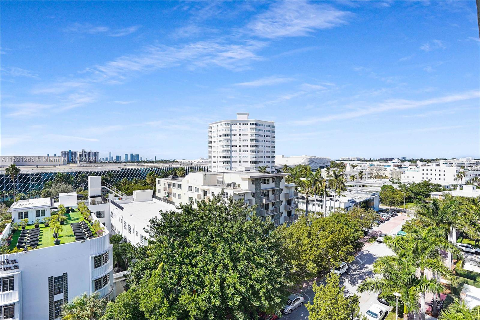 245 18th Street, Unit 902 Miami Beach, FL 33139 - Photo 27 of 54 a view of a lake with building in front of it